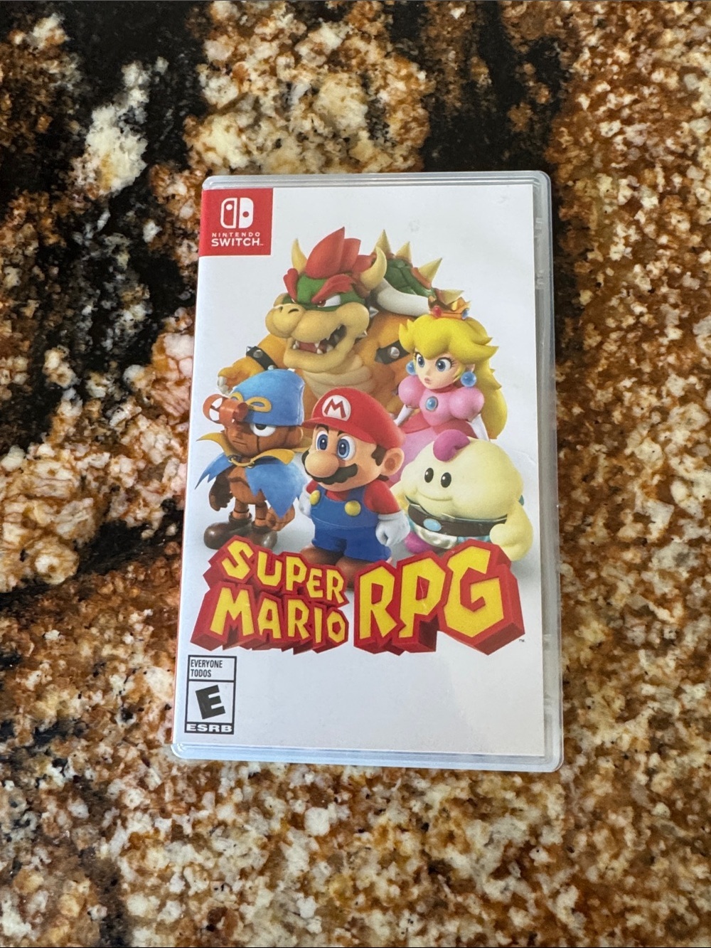 Nintendo Super Mario RPG — White Case with Red, Yellow and Blue Cover Art